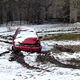 Illustration for article titled You Havent Reached Rock Bottom Until Youve Got A Totaled Kia Rio Stuck In Your Backyard